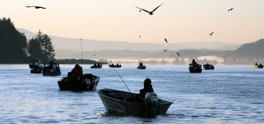 Sports fishermen congregate in Tillamook Bay.